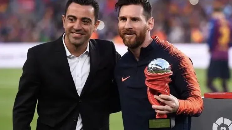 Xavi Hernández y Lionel Messi